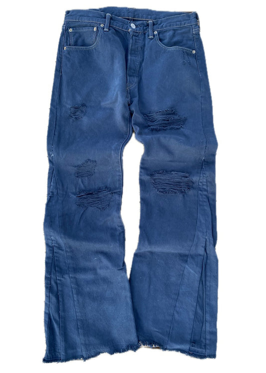 Dyed and distressed flared denim